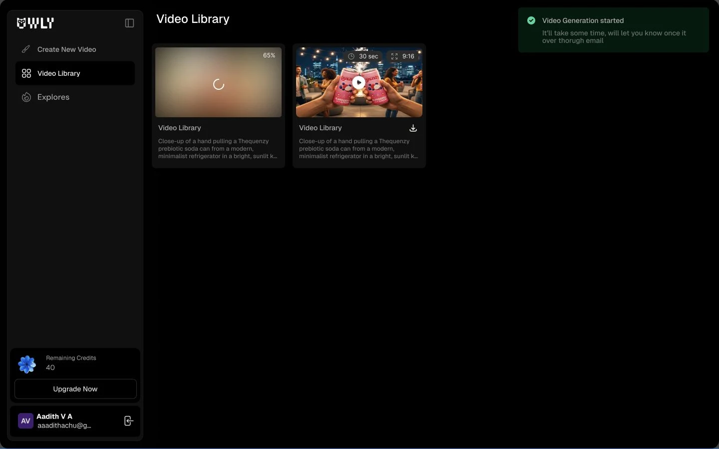 The V2 library design keeps generation progress visible while another video is ready to preview. Captured design state, not a live render.
